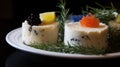 Smorgastarta - Swedish sandwich cake, layers of seafood and cream cheese, garnished with fresh herbs