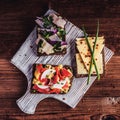 Smorrebrod - danish open sandwich with fish, herring, cheese Royalty Free Stock Photo