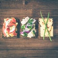 Smorrebrod - danish open sandwich with fish, herring, cheese Royalty Free Stock Photo