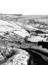 smow scene with small country road in yorkshire moor Royalty Free Stock Photo