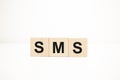 sms concept on wooden cubes. Business concept Royalty Free Stock Photo