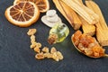 Smudge kit for spiritual practices with natural elements: Palo Santo sticks, dried orange fruit slices, SPA stones, essence Royalty Free Stock Photo