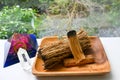 Smudge kit for spiritual practices with natural elements: Palo Santo sticks, dried white sage, Orgonite pyramid and clear quartz Royalty Free Stock Photo