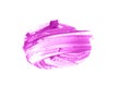 Smudged eye shadow isolated on a white background. The purple color of the cosmetic product. Creamy texture of makeup.