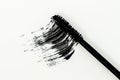 Smudged mascara texture, swatch of a brush on white background Royalty Free Stock Photo