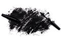 Black wand and smudged mascara on white background Royalty Free Stock Photo