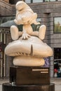 The Smurfs statue in front of MOOF comic museum, Brussels Belgium