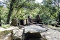 Snack area with stone barbecues and tables and benches for picnics in a glade of a typical Atlantic forest in Galicia, Spain