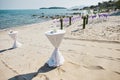 Snack, Glasses table decorating with white cloth on the beach, beach wedding venue background Royalty Free Stock Photo