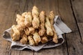 Snack of Grissini Bread Sticks on a Wooden Background Tapas Bar Homemade Bread Sticks Horizontal Photo Copy Space Royalty Free Stock Photo
