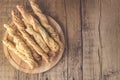 Snack of Grissini Bread Sticks on a Wooden Background Tapas Bar Homemade Bread Sticks Horizontal Top View Flat Layout Copy Space Royalty Free Stock Photo