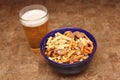 Snack mix and beer Royalty Free Stock Photo