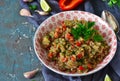 Snack salad of roasted eggplant with garlic and tomato