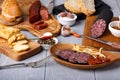 Variety of salami, cheese chechil and bread Royalty Free Stock Photo