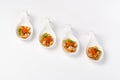 Snack to buffet in glass boats on a white background