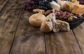 Snack to wine. Fresh baked bread. Different snack for wine. Cheese, olives, grapes copy space Royalty Free Stock Photo