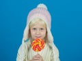 Snack on when you please. Little child with sweet lollipop. Little girl hold lollipop on stick. Happy candy girl. Happy