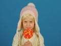 Snack on when you please. Little child with sweet lollipop. Little girl hold lollipop on stick. Happy candy girl. Happy