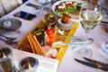 Snacks at the banquet table in the restaurant. Table setting.