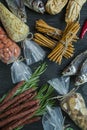 Snacks for beer. Set for beer. Nuts, crackers, fried potatoes in strips. View from above. Dark wooden background Royalty Free Stock Photo