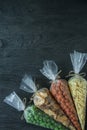 Snacks for beer. Set for beer. Nuts, crackers, fried potatoes in strips. View from above. Space for text. Dark wooden background Royalty Free Stock Photo