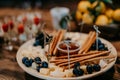 Snacks at the buffet - cheese, grapes, tomatoes, olives - catering