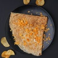 a photograph of chocolate Dosas in a dish