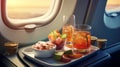 Snacks and juice served by a warm flight attendant