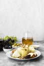 Snacks with wine - various types of cheeses, figs, nuts, honey,