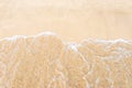 Sandy shore soft wave slashing tropical sea above view foam Royalty Free Stock Photo