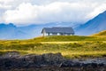 A beautiful wooden house in a green island of Atlantic Ocean in Iceland