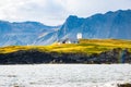 A beautiful wooden house in a green island of Atlantic Ocean in Iceland