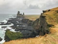 Snaefellsness national park in Iceland Londrangar volcanic basalt towers at cliff coast