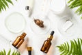 Snail mucin products at white background. Natural cosmetic.