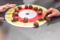 Snail racing. Red-yellow circles of the competition field, gray background