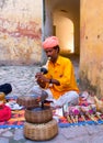 Snake charmer in Amber Fort in Jaipur, India.