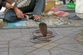 Snake charmers in Jemaa al Fnaa, Marrakech. MOROCCO. Royalty Free Stock Photo