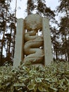 A snake in the grass sculpture in a park in Kyiv or Kiev