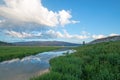 Snake River in the morning under cumulus clouds in Alpine Wyoming Royalty Free Stock Photo