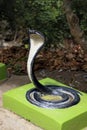 Snake statue in the garden.