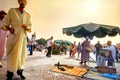 Snakes charmers and musicians entertein tourists in Djemaa el Fna market place. Marrakesh, Morocco