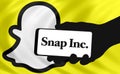 Snap company with Snapchat logo in background Royalty Free Stock Photo