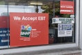 SNAP and EBT Accepted here sign. SNAP and Food Stamps provide benefits to help the budgets of disadvantaged families Royalty Free Stock Photo