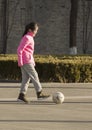 Snap portrait of foot ball playing girl