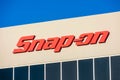 Snap-on sign, logo. Snap-on Incorporated is an American designer, manufacturer and marketer of high-end tools and equipment. - San