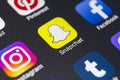 Snapchat application icon on Apple iPhone 8 smartphone screen close-up. Snapchat app icon. Snapchat is an online social networking