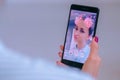 Snapchat multimedia messager with 3d face mask filter on smartphone