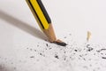 Snapped and broken pencil tip on a paper Royalty Free Stock Photo
