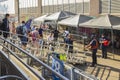 A snapshot capturing the scene of tourists disembarking from a sightseeing boat in New York City. Royalty Free Stock Photo