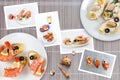 Snapshots of various sandwiches with seafood arranged on rustic wooden background with plates with food and seashells Royalty Free Stock Photo